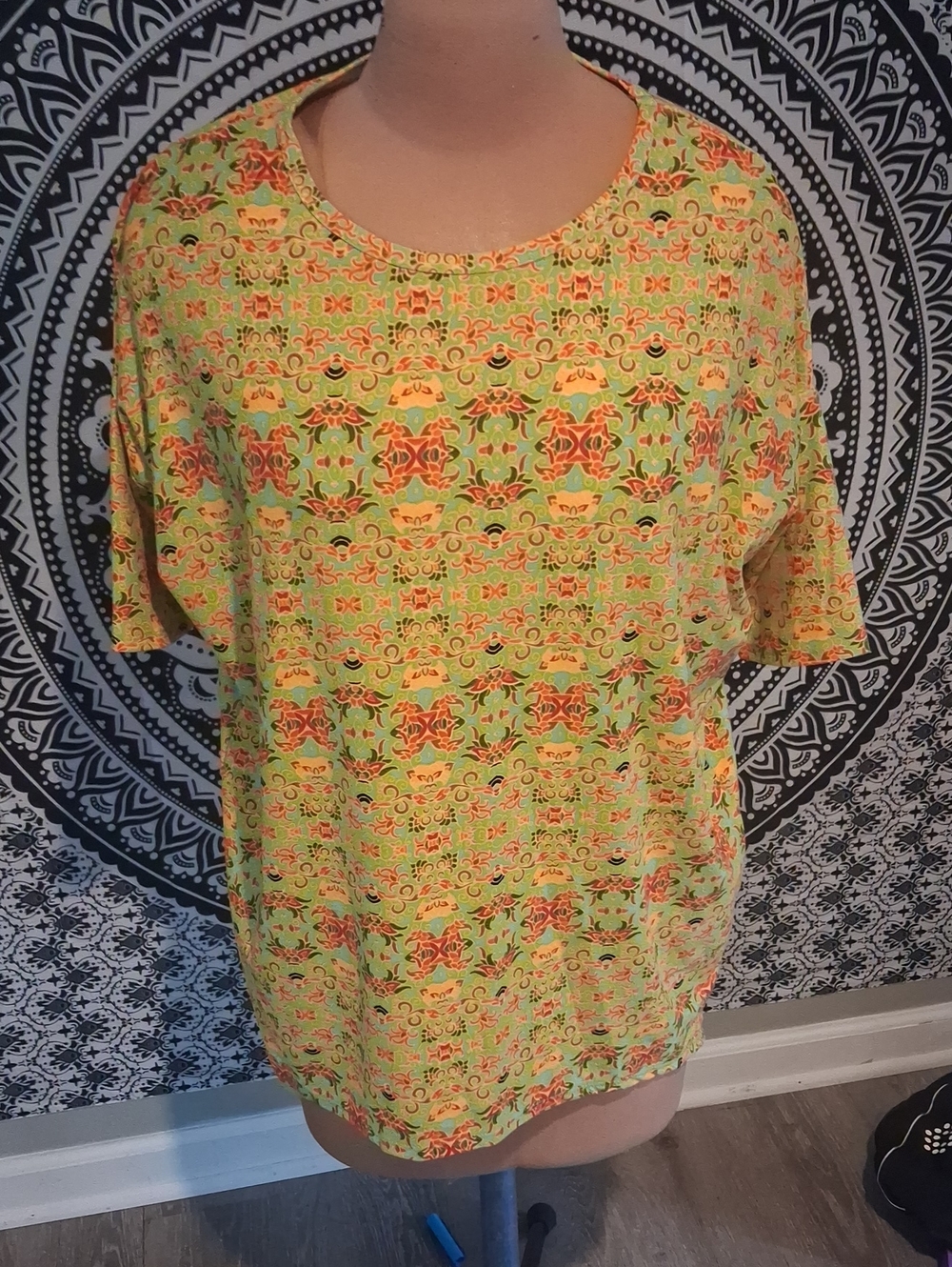 LuLaRoe Light Green Short Sleeve Tee with Orange Floral Motif